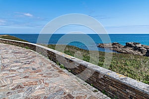 Footpath on the shores of the Cantabrian Sea in Foz, Spain
