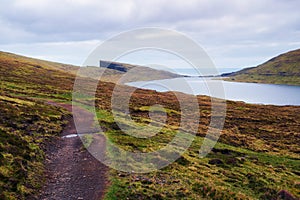 Footpath to lake Sorvagsvatn on island of Vagar, Faroe Islands, Denmark.