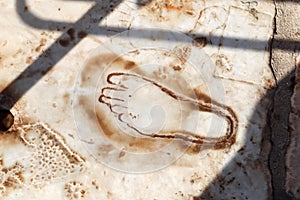 Footprint carved in marble in ancient Ephesus city, Turkey that show to the whorehouse