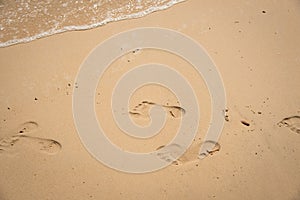 Footprint relax in summer time on sand beach island nature