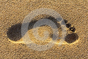 Footprint in sand abstract background