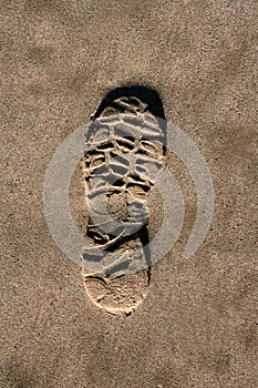 Footprint shoe on beach brown sand texture print