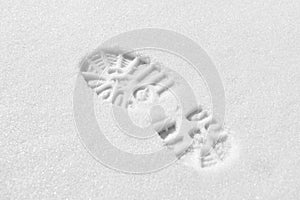 A footprint on the snow