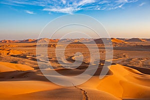 Footprints in the dunes in the desert of Rub al Khali or Empty Quarter