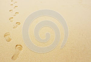 Footprints in the sand background photo