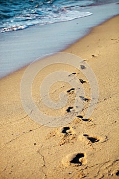 Footprints on sand beach