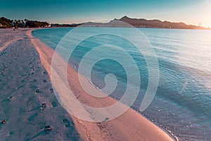 Footprints in the sand on beautiful summer beach. Holidays vacation concept photo