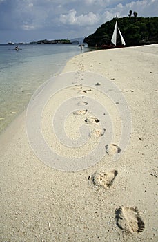 footprints in sand boracay beach philippines