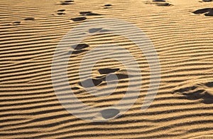 Footprints on a sand