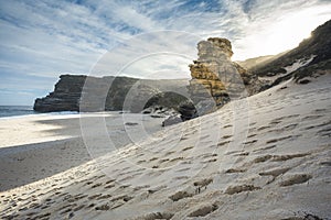 Footprints in sand at dias beach next to cape point photo