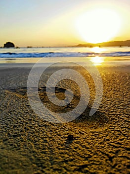 footprints on the sand on the famous beach of Trenggalek, Indonesia