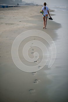 footprints in the sand for the girl