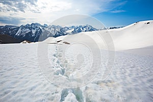 Footprints in the snow, Karachay-Cherkessia, Russia. Caucasus Mountains landscape