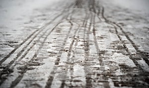 Footprints on the snowy sidewalk