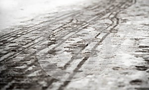 Footprints on the snowy sidewalk