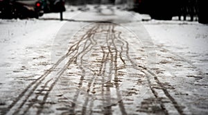 Footprints on the snowy sidewalk