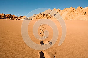 Footprints at Valle de la Muerte in Atacama Desert