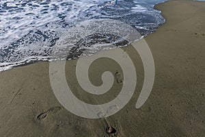 footprints of a woman on the beach of the Mediterranean Sea2