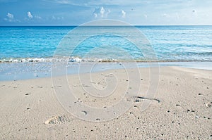 Footsteps on the sand of a Cuban beach