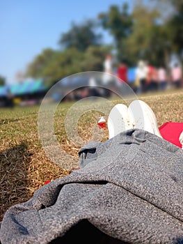 footware on grass on blurred nature background photo