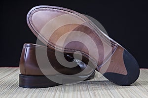 Footwear Concepts and Ideas. Backside View of Penny Loafer Natural Leather Sole