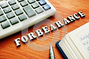 Forbearance word from wooden letters