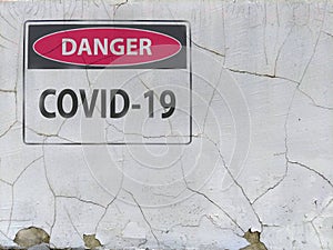 Forbidden sign danger coronavirus covid-19 at the plaster asbest