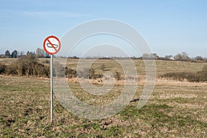 Forbidden tank sign on a field