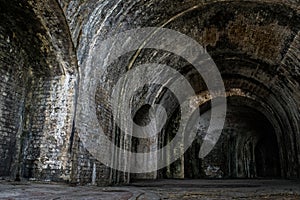 Foreboding brick interior passage inside Fort Pickens