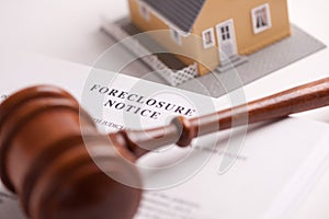 Foreclosure Notice, Gavel and Home