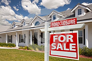 Foreclosure Real Estate Sign and House - Right photo