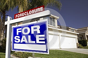 Foreclosure For Sale Real Estate Sign and House photo