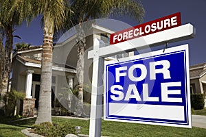 Foreclosure For Sale Real Estate Sign and House photo