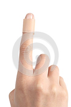 Forefinger of a woman hand with a band aid photo