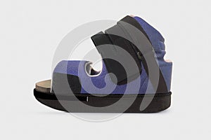 Forefoot Off-loading Shoe after fractures. Detachable therapeutic shoes. Post operative heel shoe on white background. Medical Ort