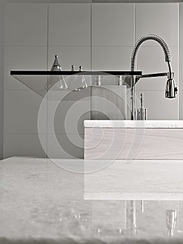 Foreground of the steel tap in the modern kitchen