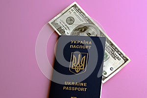 Foreign passport of a citizen of Ukraine and dollars