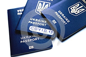 Foreign passports and the inscription `coronavirus` on one of them.