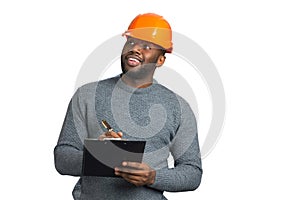 Foreman in casual wear checking object.