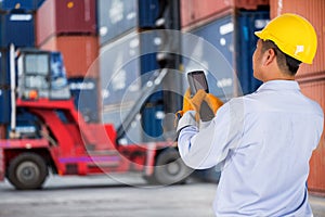 Foreman control forklift handling the container box