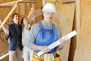 Foreman with house plans