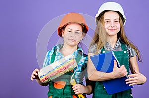 Foreman inspector. Repair. small girls repairing together in workshop. Labor day. 1 may. engineering idea. Little kids