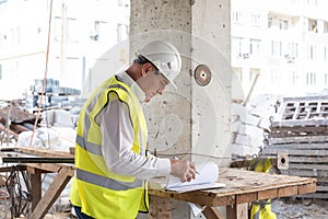 Foreman officer inspector, building Inspector, engineer or inspector at construction site checking and inspecting