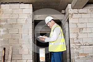 Foreman officer inspector, building Inspector, engineer or inspector at construction site checking and inspecting