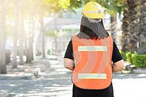 Foreman oversee construction work, wear reflective workwear for photo