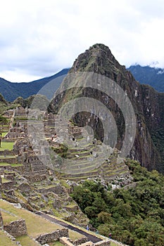 The foremost section of Machu Picchu including the Industrial Zone, Prisoner`s Area, agricultural terraces and Huayna Picchu