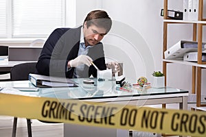 Forensic Expert Searching For Crime Evidence