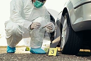 Forensic Science. Criminologist investigates a crime scene.