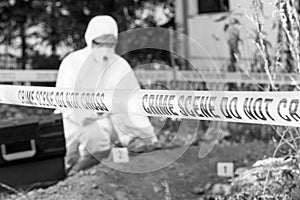 Forensic science specialist at crime scene investigation