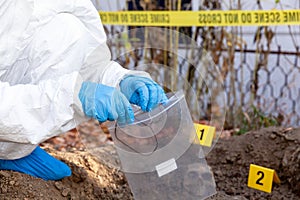 Forensic science specialist work at a crime scene investigation